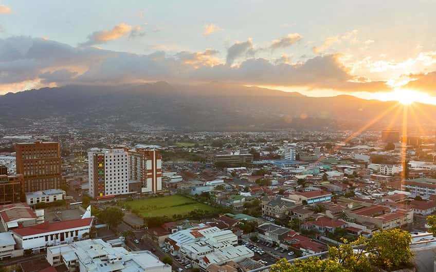 San Jose Costa Rica weather may vary depending on the hour of the day, in the picture, the city’s sunset seen from above.